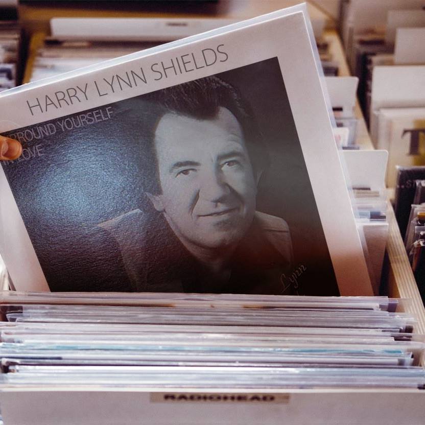 Harry Lynn Shields record artwork among a collection of vinyl records